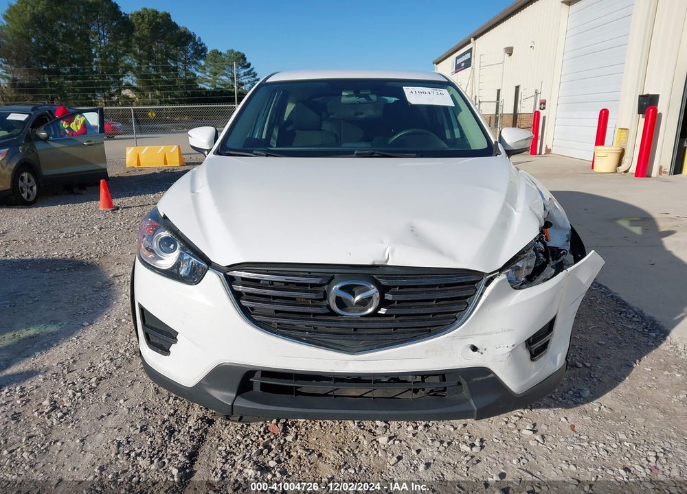 2016 MAZDA CX-5 SPORT VIN: JM3KE2BY6G0864478