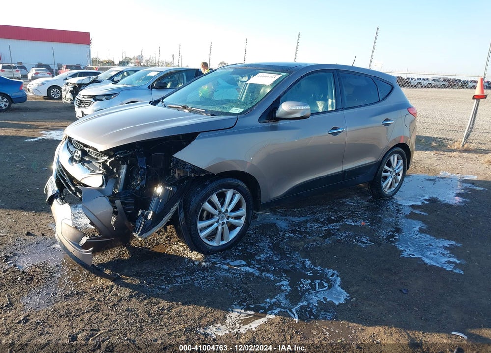 2012 HYUNDAI TUCSON LIMITED VIN: KM8JU3AC8CU498296