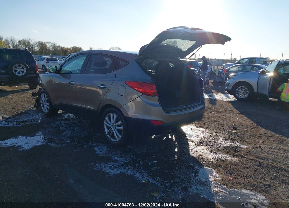 2012 HYUNDAI TUCSON LIMITED VIN: KM8JU3AC8CU498296