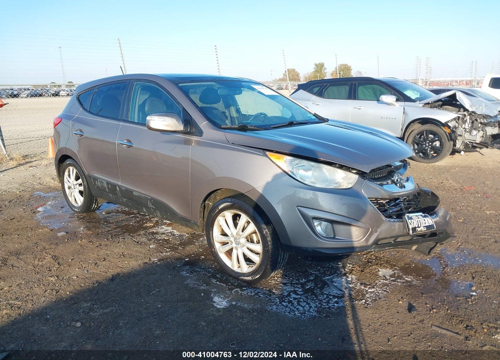 2012 HYUNDAI TUCSON LIMITED VIN: KM8JU3AC8CU498296