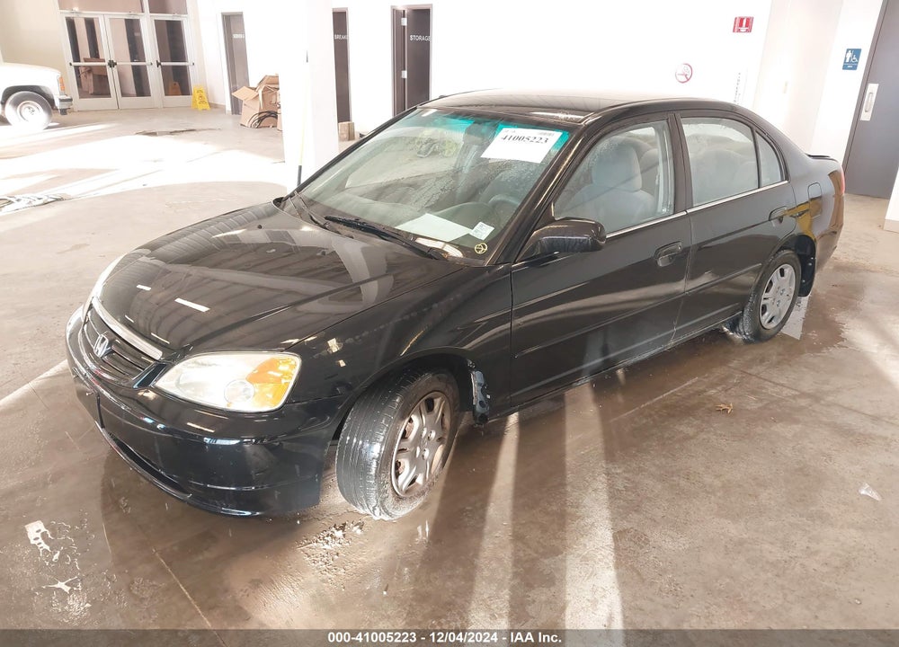 2001 HONDA CIVIC LX VIN: 1HGES16561L015290