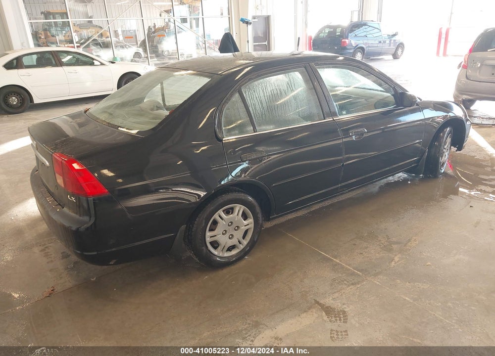 2001 HONDA CIVIC LX VIN: 1HGES16561L015290