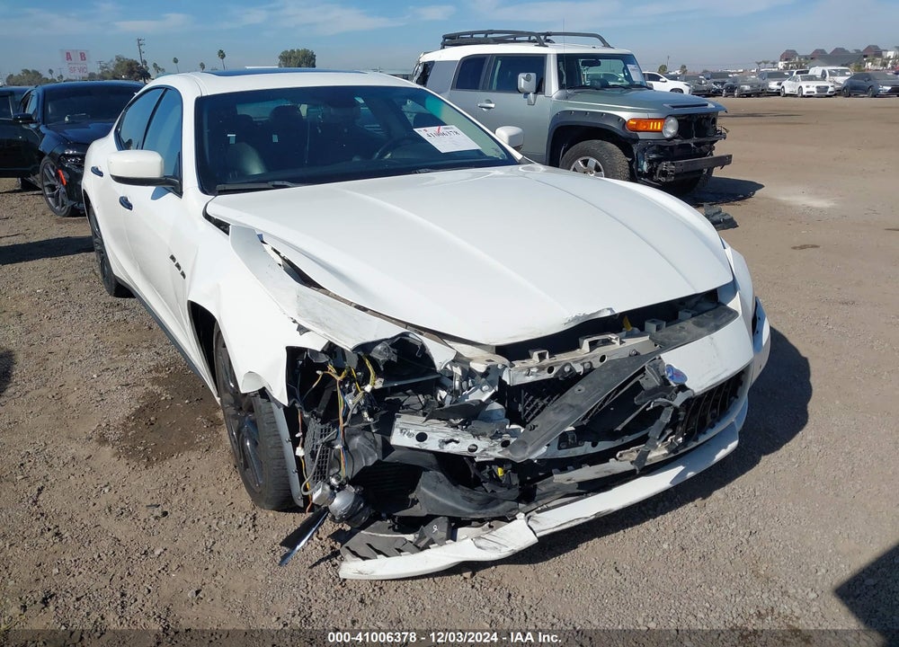 2014 MASERATI GHIBLI VIN: ZAM57RTA1E1085941