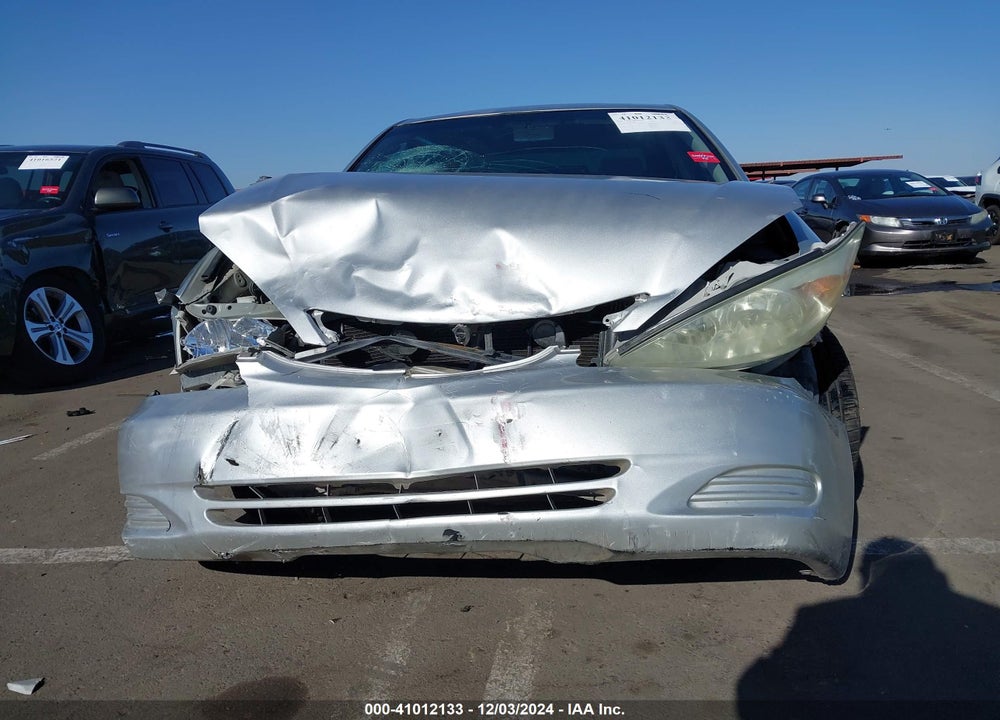 2003 TOYOTA CAMRY LE VIN: JTDBE32K730220198