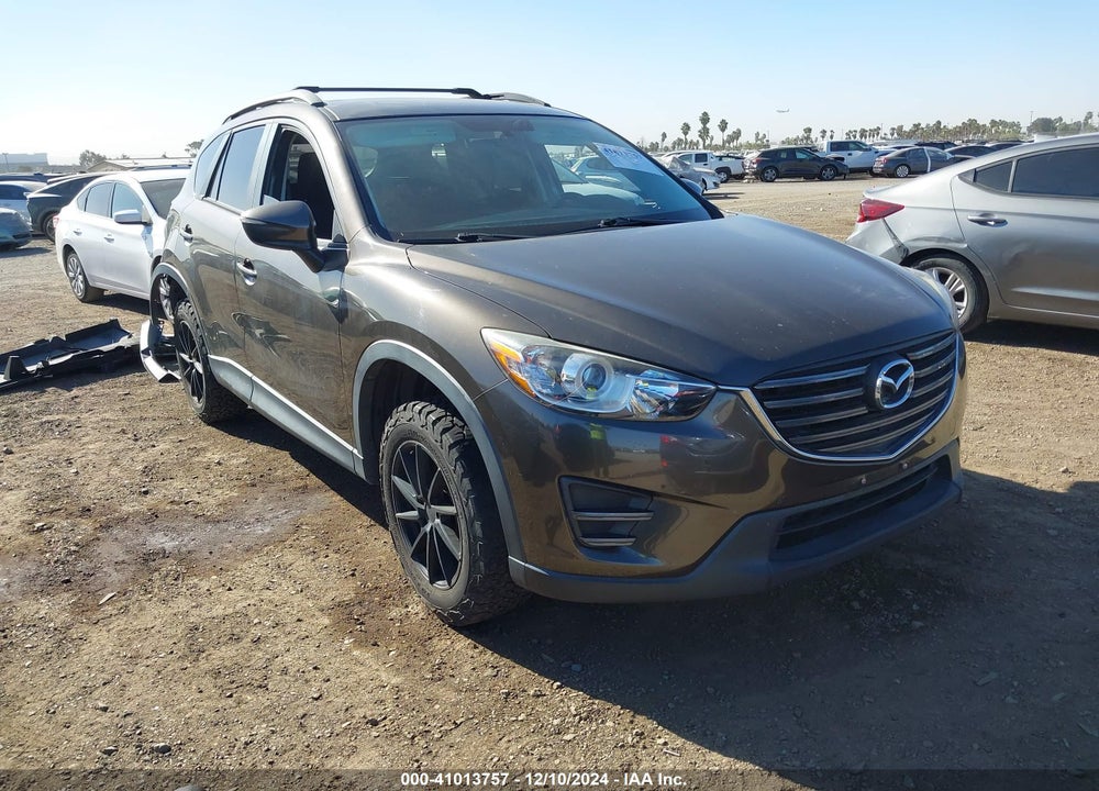 2016 MAZDA CX-5 SPORT VIN: JM3KE2BY4G0889623