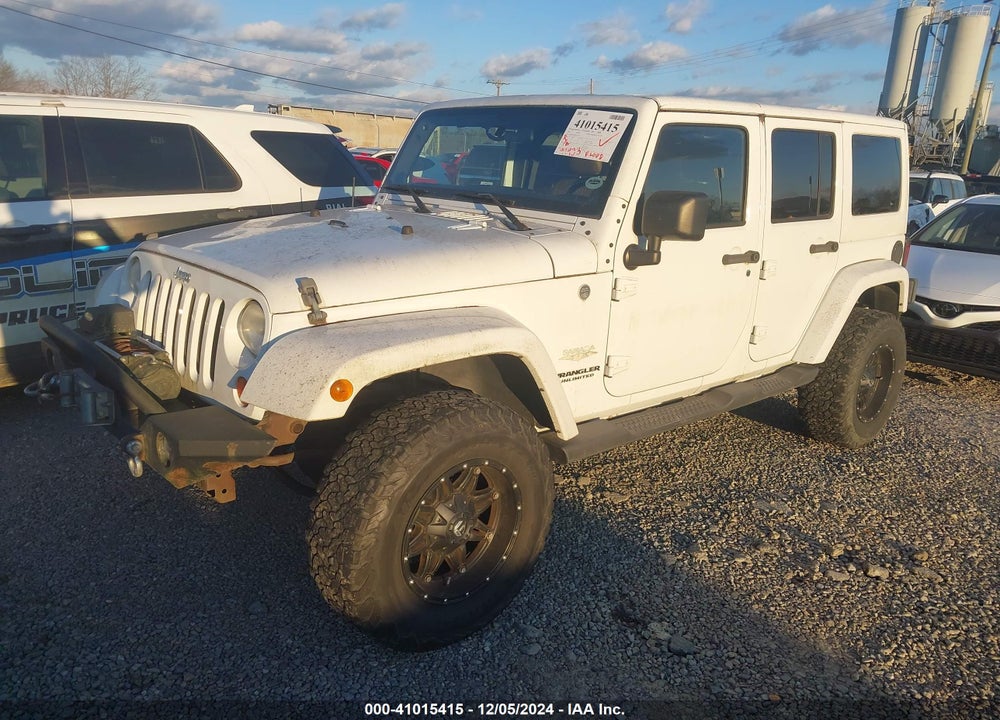 2011 JEEP WRANGLER UNLIMITED SAHARA VIN: 1J4HA5H1XBL557374