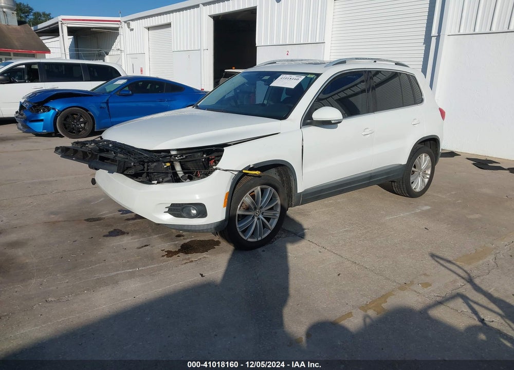 2016 VOLKSWAGEN TIGUAN SE VIN: WVGAV7AX4GW027733