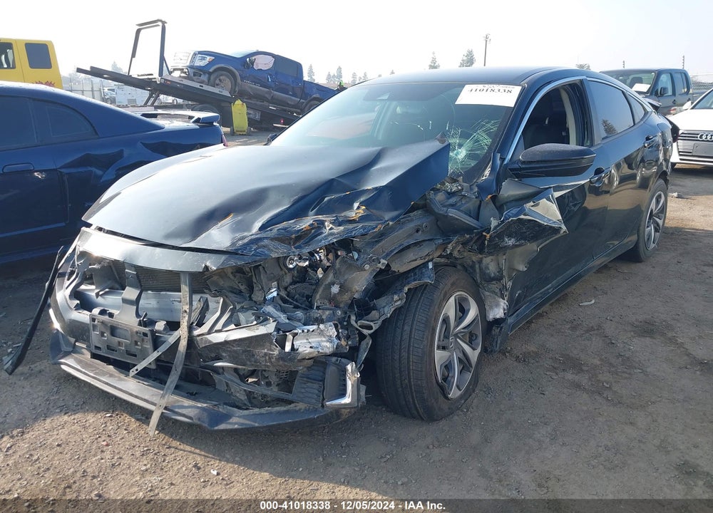 2019 HONDA CIVIC LX VIN: 19XFC2F6XKE212598