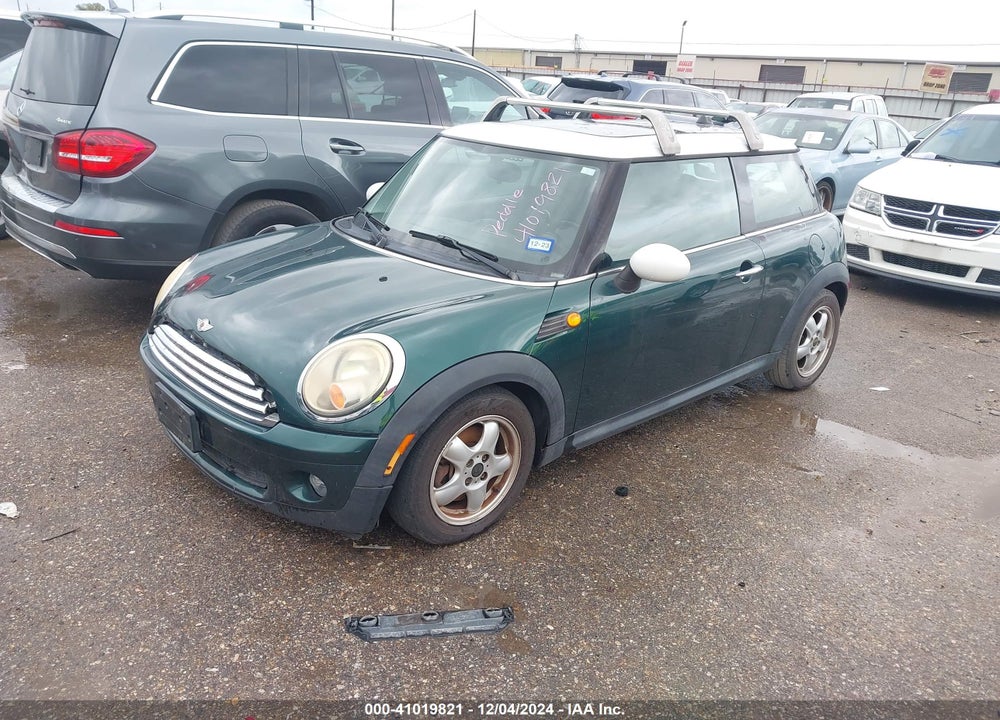 2009 MINI COOPER VIN: WMWMF33529TW75107