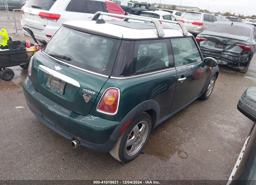 2009 MINI COOPER VIN: WMWMF33529TW75107