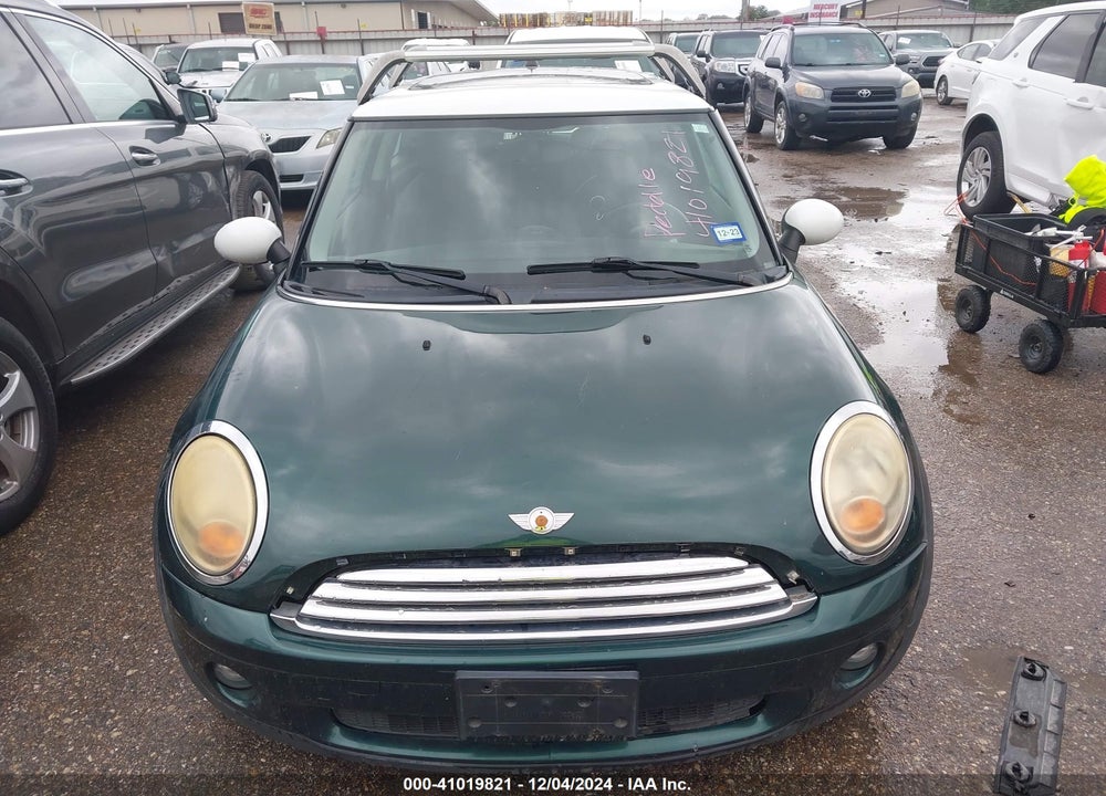 2009 MINI COOPER VIN: WMWMF33529TW75107