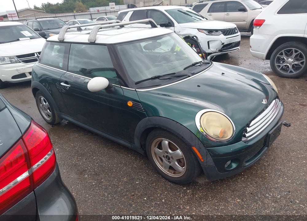 2009 MINI COOPER VIN: WMWMF33529TW75107