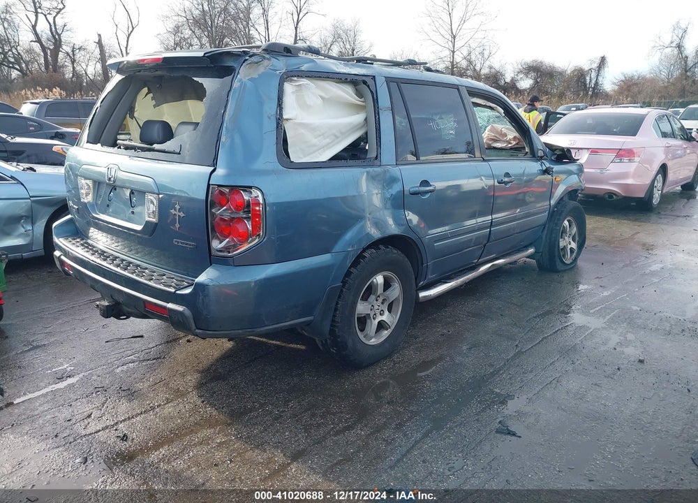 2007 HONDA PILOT EX-L VIN: 5FNYF18547B013756