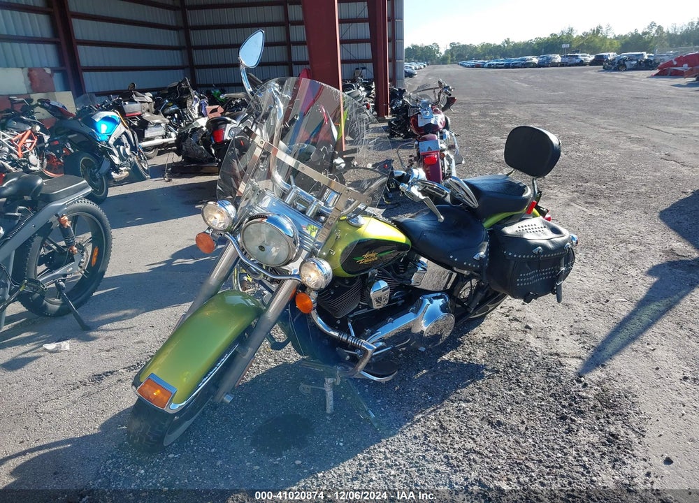 2011 HARLEY-DAVIDSON FLSTC VIN: 1HD1BW515BB034265