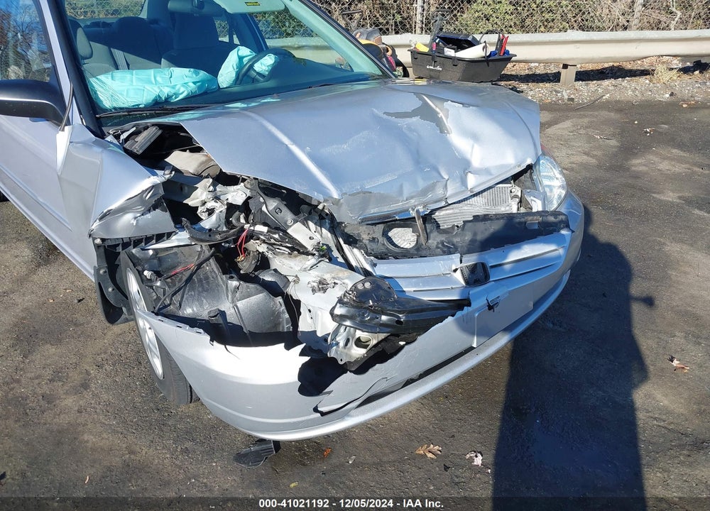 2001 HONDA CIVIC LX VIN: 1HGES16501L076053
