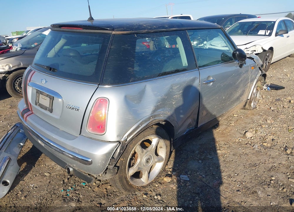 2004 MINI COOPER VIN: WMWRC334X4TJ62329