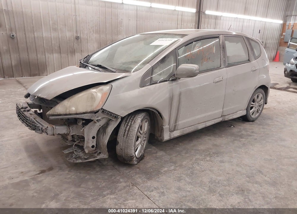 2010 HONDA FIT VIN: JHMGE8H43AS023931