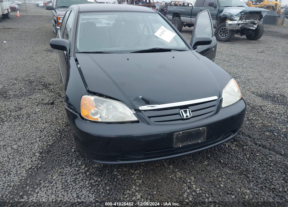 2002 HONDA CIVIC LX VIN: 1HGES15522L012759