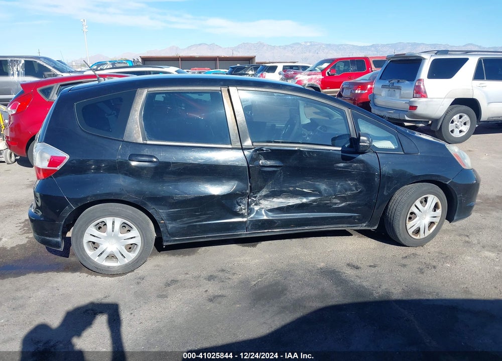 2009 HONDA FIT VIN: JHMGE88249S014276