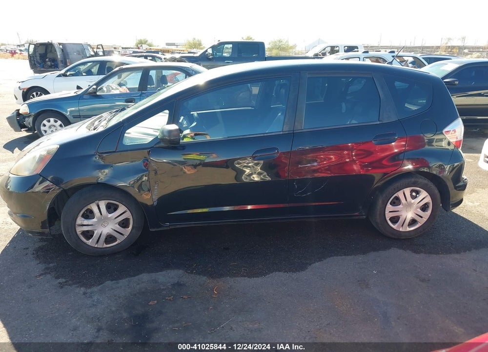 2009 HONDA FIT VIN: JHMGE88249S014276