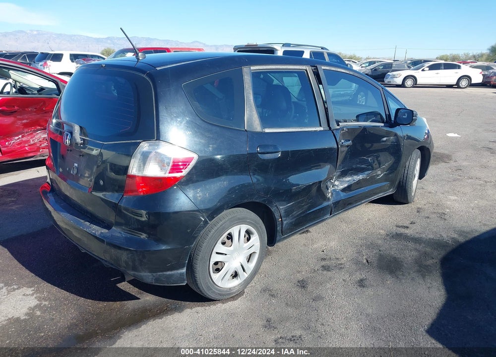 2009 HONDA FIT VIN: JHMGE88249S014276