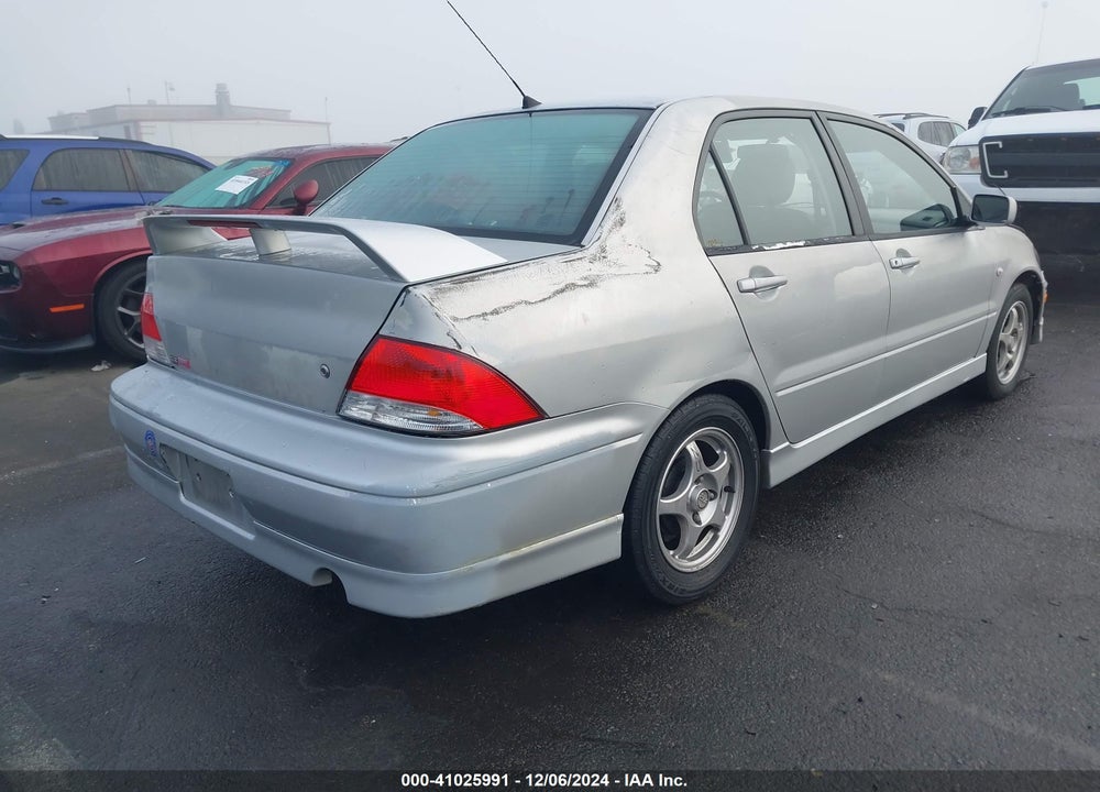 2002 MITSUBISHI LANCER VIN: JA3AJ86E92U038601