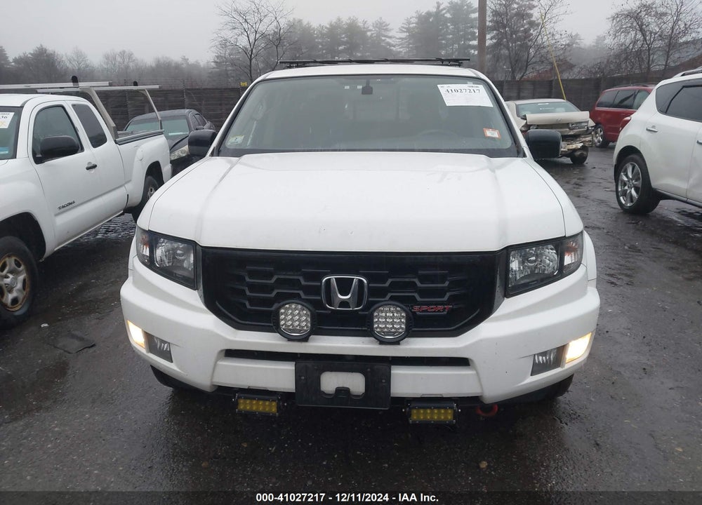 2014 HONDA RIDGELINE SPORT VIN: 5FPYK1F72EB002131