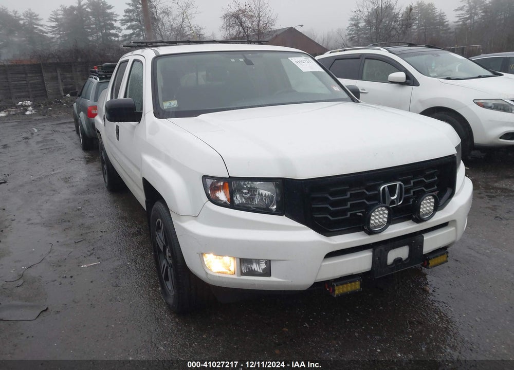 2014 HONDA RIDGELINE SPORT VIN: 5FPYK1F72EB002131