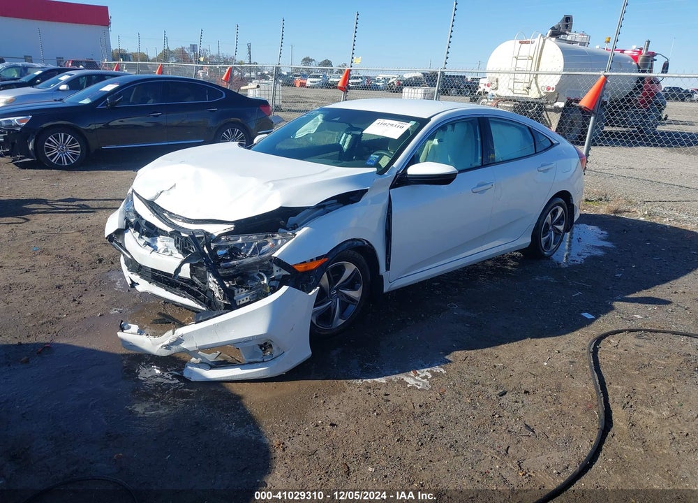 2021 HONDA CIVIC LX VIN: 2HGFC2F62MH556256