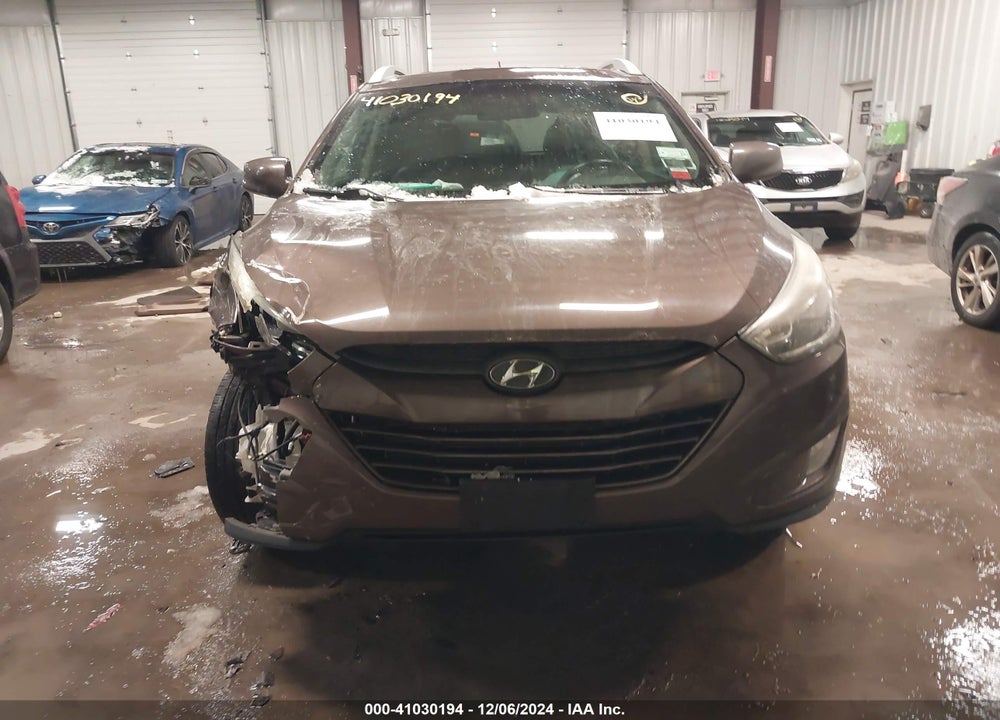 2014 HYUNDAI TUCSON SE VIN: KM8JU3AG1EU803370
