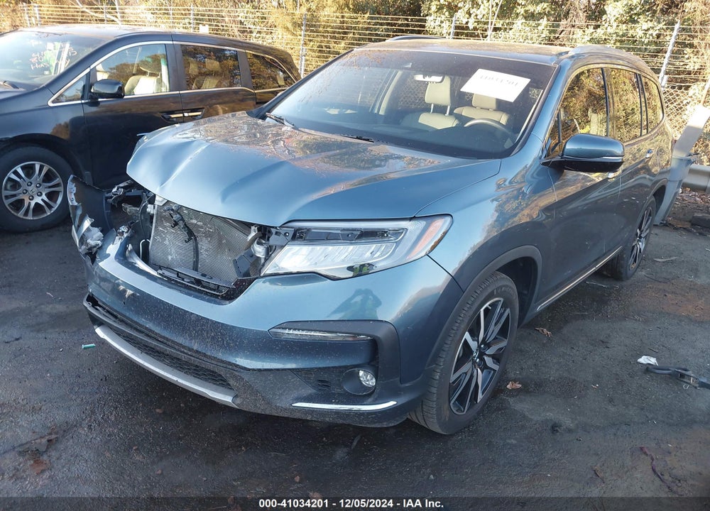2020 HONDA PILOT 2WD TOURING 7 PASSENGER VIN: 5FNYF5H61LB009044