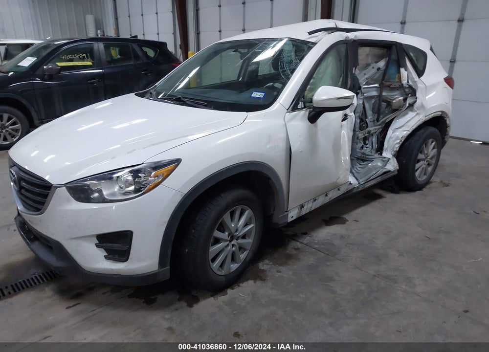 2016 MAZDA CX-5 SPORT VIN: JM3KE2BY3G0880315