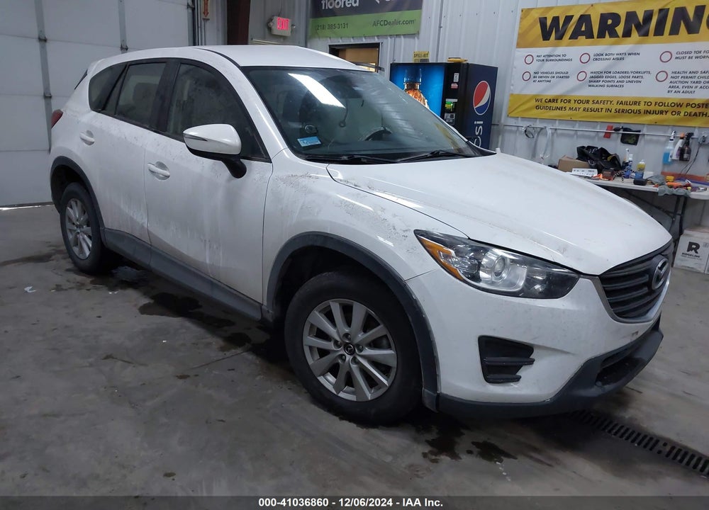 2016 MAZDA CX-5 SPORT VIN: JM3KE2BY3G0880315