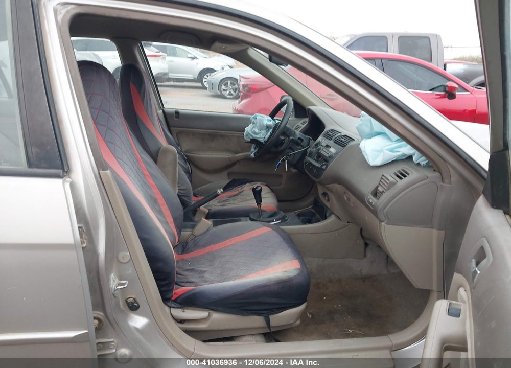 2002 HONDA CIVIC LX VIN: 1HGES155X2L033004