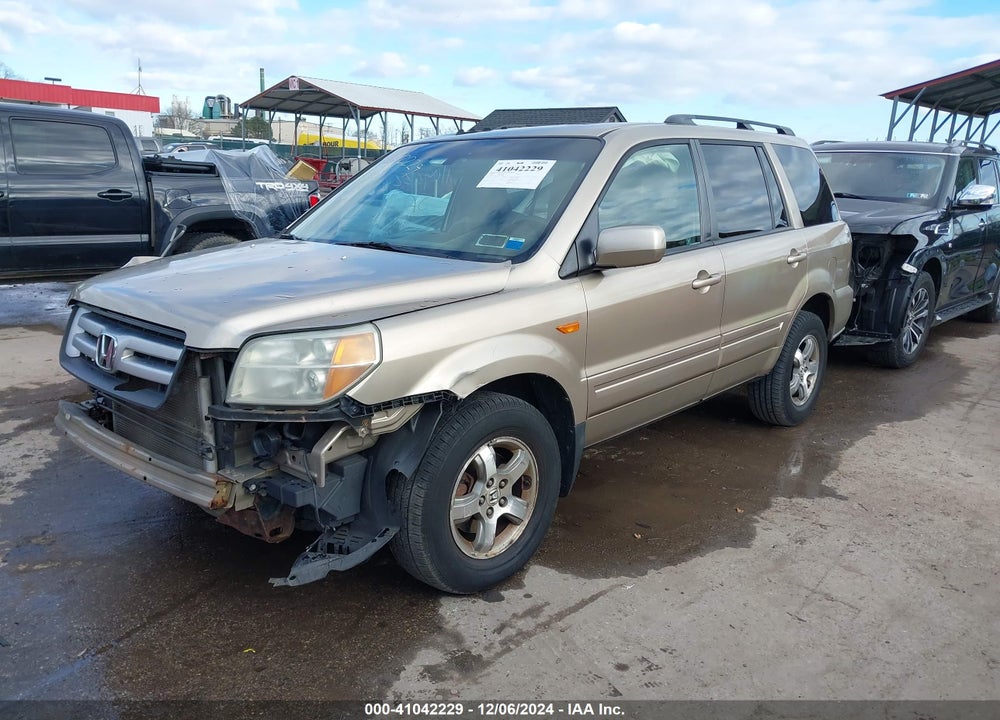 2006 HONDA PILOT EX-L VIN: 2HKYF18596H555399