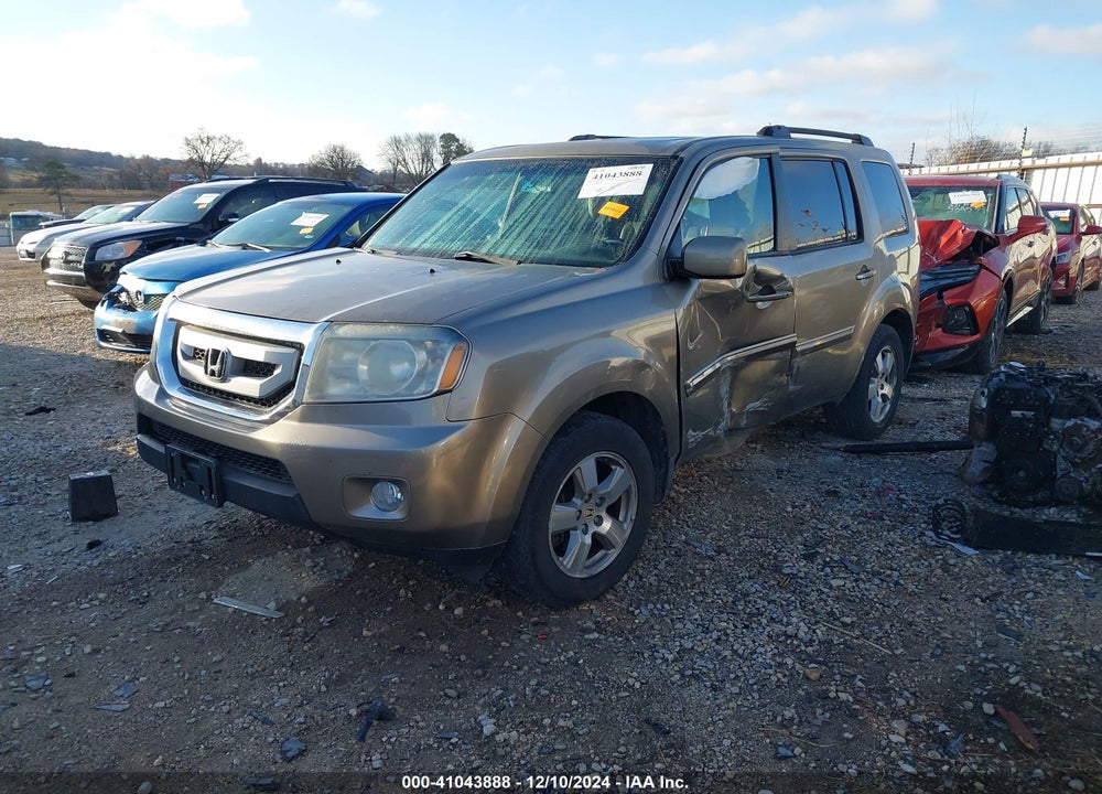 2011 HONDA PILOT EX-L VIN: 5FNYF4H60BB082561