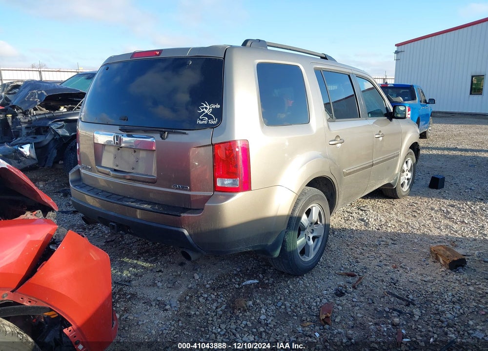 2011 HONDA PILOT EX-L VIN: 5FNYF4H60BB082561