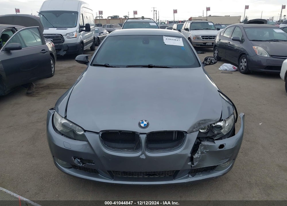 2009 BMW 335I VIN: WBAWL73559P180692