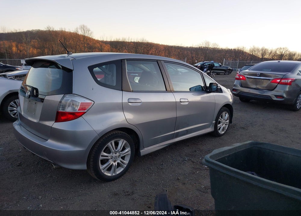 2009 HONDA FIT SPORT VIN: JHMGE88439S029448