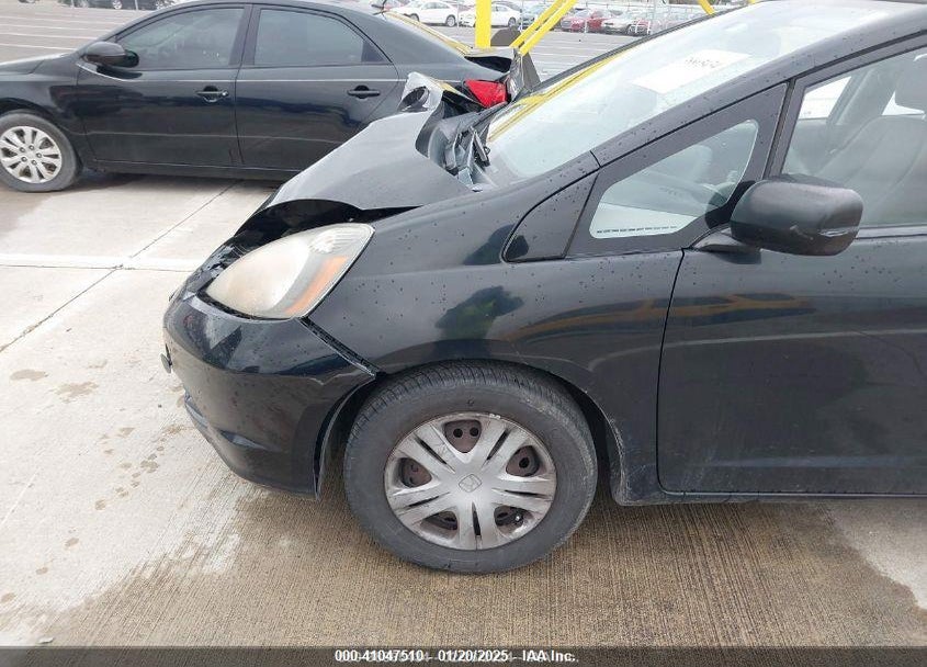 2009 HONDA FIT VIN: JHMGE87239S068654