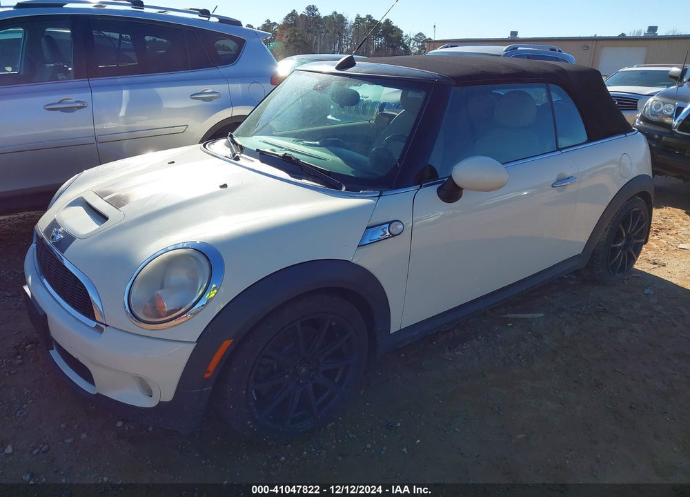 2009 MINI COOPER S VIN: WMWMS33569TG88859
