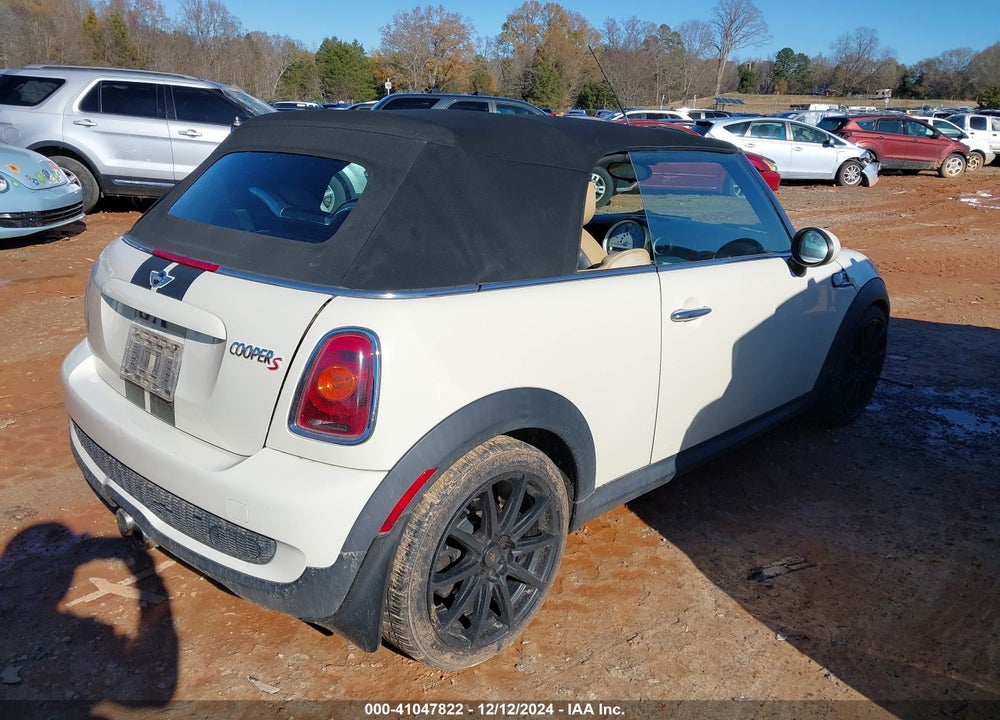 2009 MINI COOPER S VIN: WMWMS33569TG88859