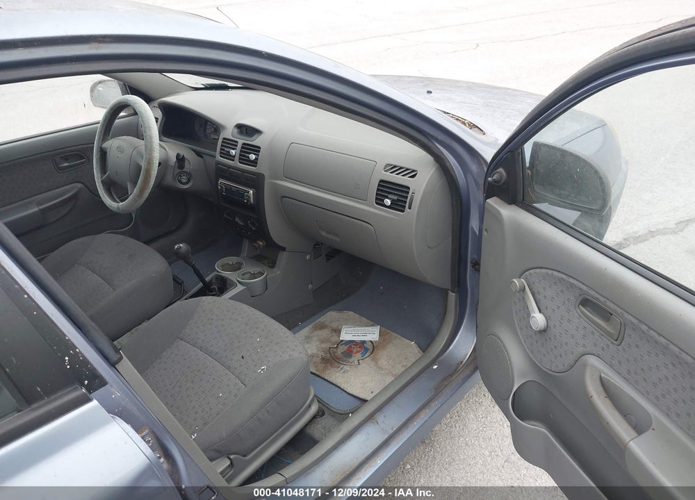 2003 KIA RIO VIN: KNADC125336270443