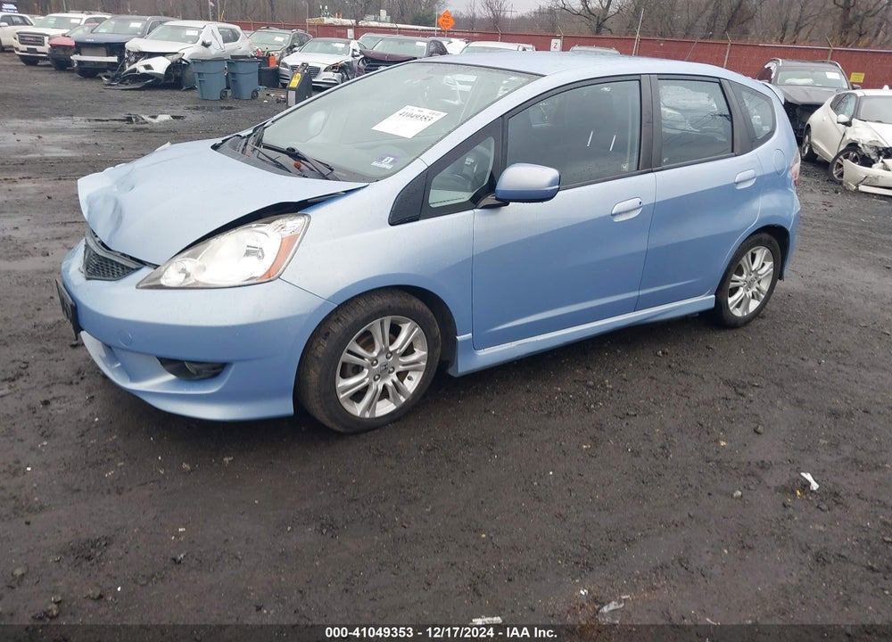 2009 HONDA FIT VIN: JHMGE88449S031676