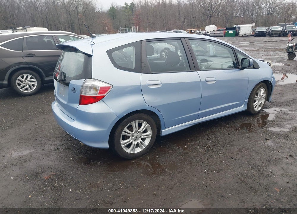 2009 HONDA FIT VIN: JHMGE88449S031676