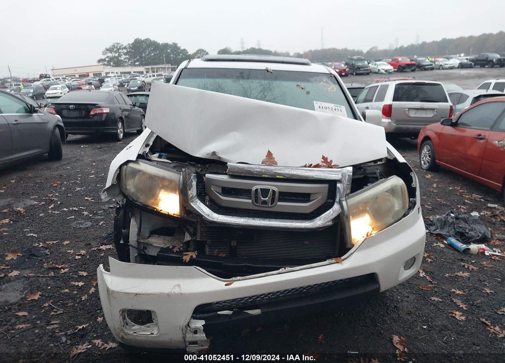 2011 HONDA PILOT EX-L VIN: 5FNYF3H58BB033609