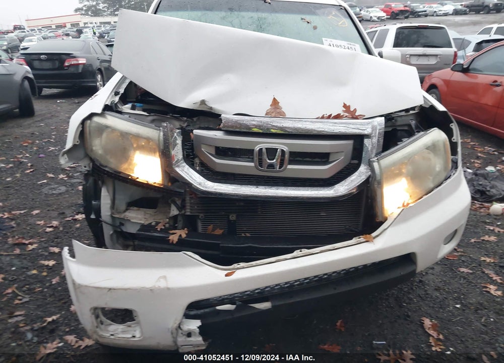2011 HONDA PILOT EX-L VIN: 5FNYF3H58BB033609