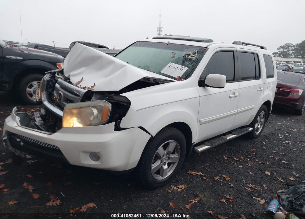 2011 HONDA PILOT EX-L VIN: 5FNYF3H58BB033609