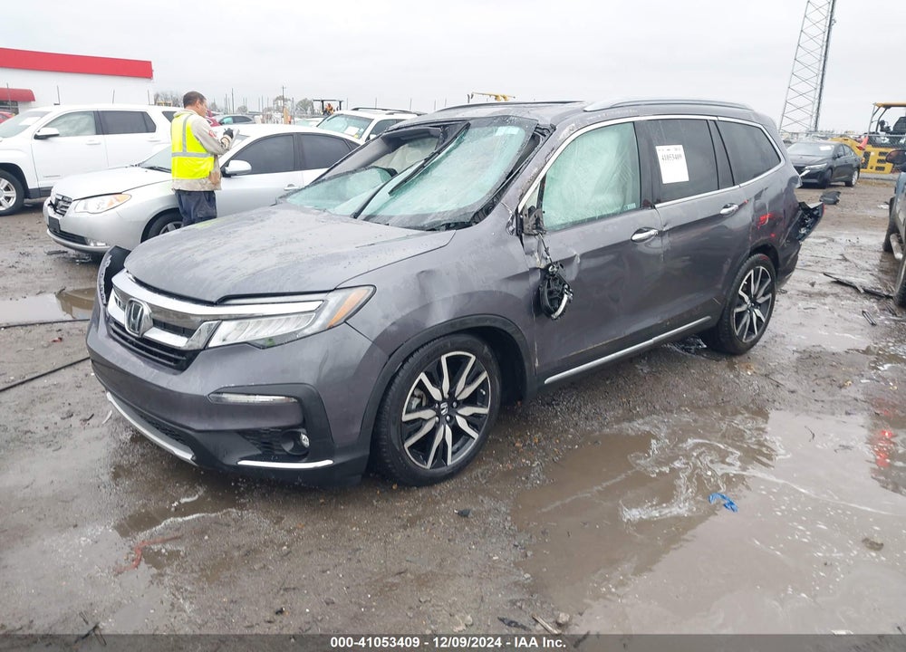 2021 HONDA PILOT 2WD TOURING 7 PASSENGER VIN: 5FNYF5H69MB029611