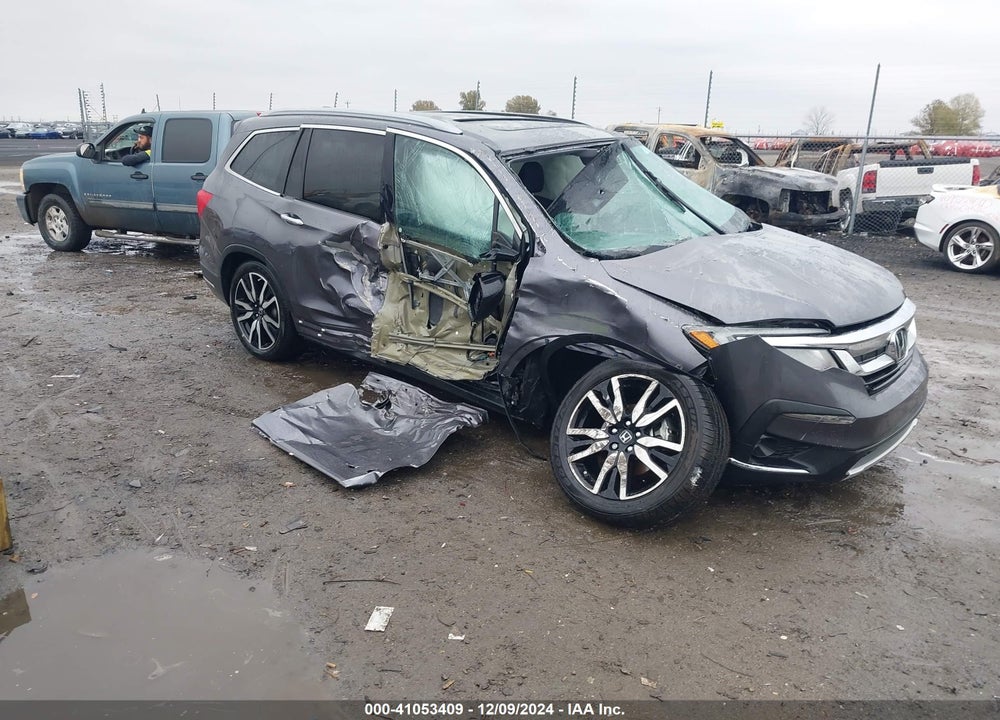 2021 HONDA PILOT 2WD TOURING 7 PASSENGER VIN: 5FNYF5H69MB029611